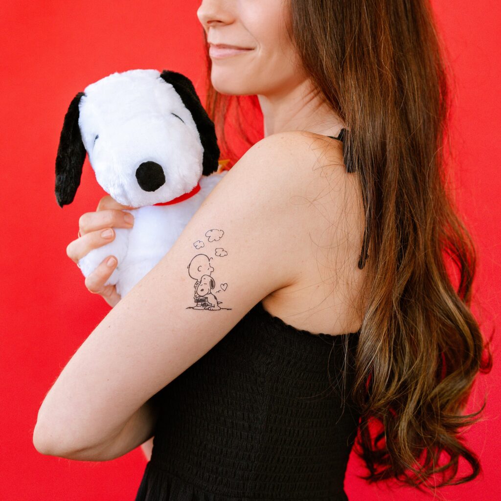 Snoopy tattoo ideas clean linework minimal shading