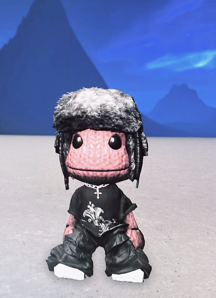 Aesthetic Sackboy PFP with glowing bokeh background and warm tones