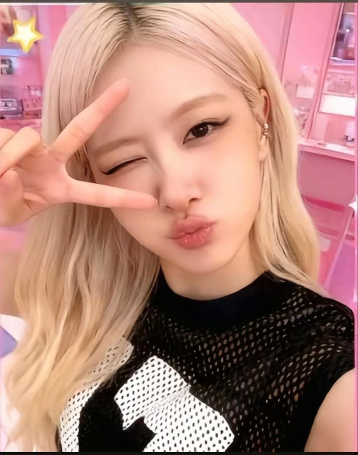 Blackpink Rosé profile picture with floral overlay and pink gradient