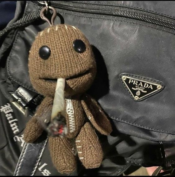 Sackboy Batman PFP with dark cape costume and dramatic shadowed lighting