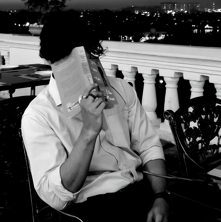 Sad male aesthetic PFP with cool tones, grain texture, and introspective isolation