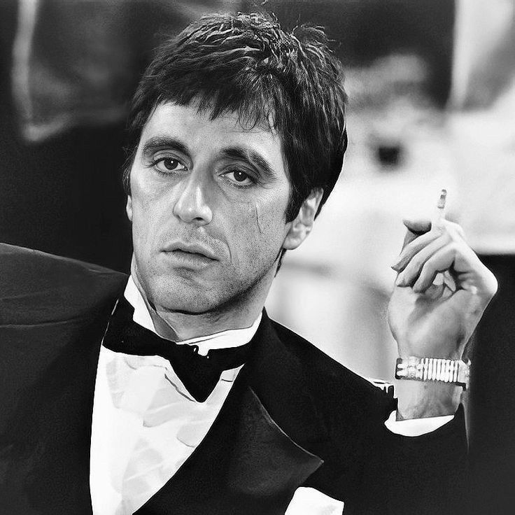 Black and white Scarface profile picture with vintage film grain texture