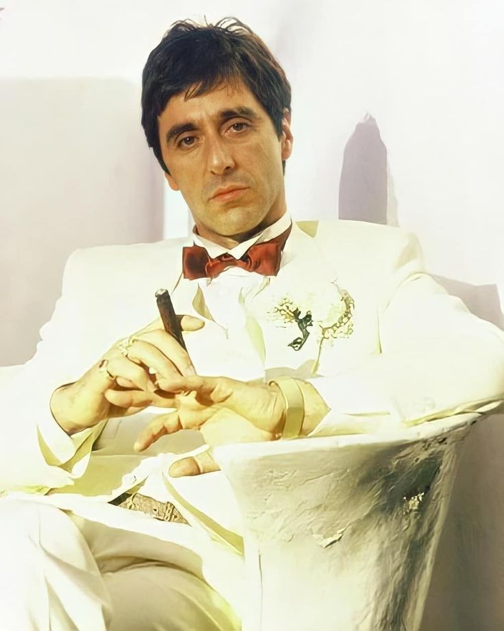 Iconic Tony Montana Scarface PFP with dark lighting and confident body language
