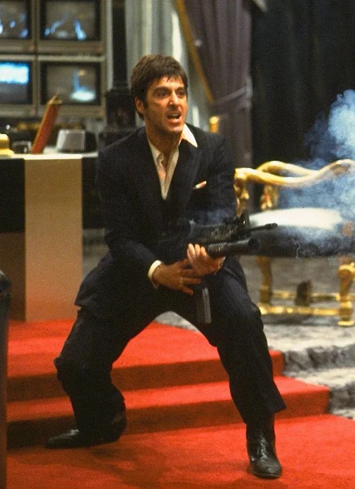 Tuff Scarface profile picture with dark suit and street-style cinematic framing