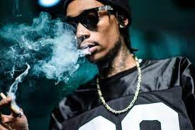 Hip-hop aesthetic smoking PFP with grain overlay and warm street lighting